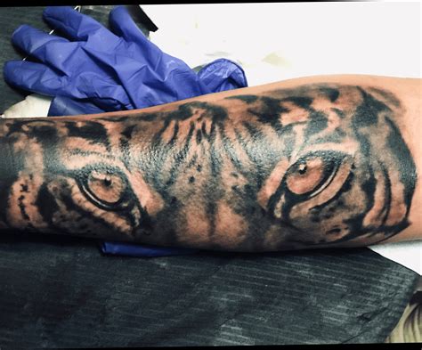 40 Tiger Eyes Tattoo Designs for Men